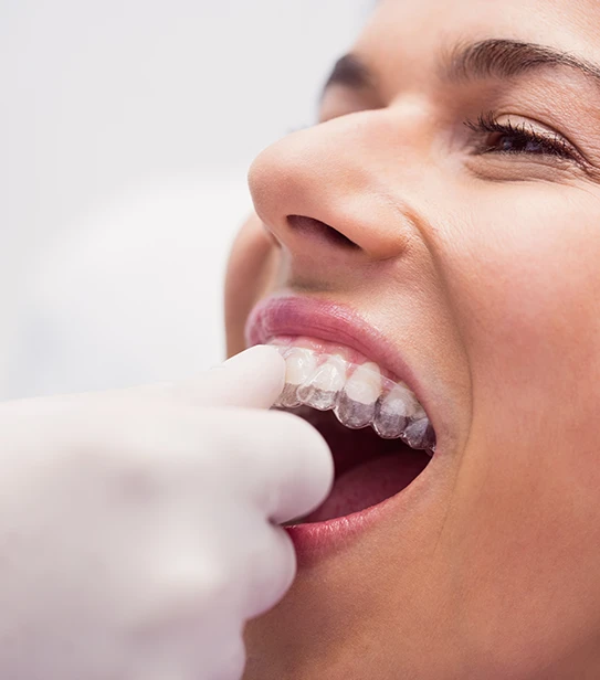 Professional orthodontic treatment and braces adjustment for a patient at a dental clinic.